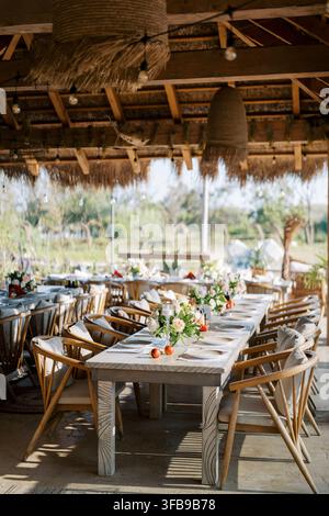 Elegant outdoor wedding reception table setting Stock Photo