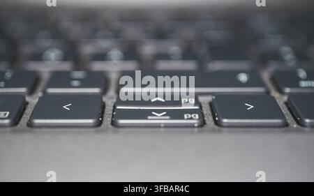Close up macro photograph of computer keyboard arrow keys in soft light Stock Photo
