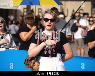MADRID, SPAIN - AUGUST 23: Members of the Ukrainian community gathered at Puerta del Sol in Madrid and marched through the streets of the city to Plaza de Cibeles in commemoration of Ukrainian Flag Day and the 35th anniversary of Ukraine's independence. Credit: Aaron Heredia Sánchez/Alamy Live News Stock Photo