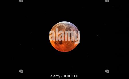 A partial lunar eclipse. Stock Photo