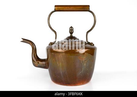 Large vintage copper kettle tea pot on a white background Stock Photo