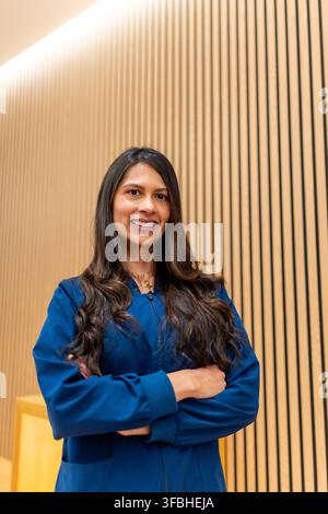 Professional woman smiling in aesthetic clinic atmosphere Stock Photo