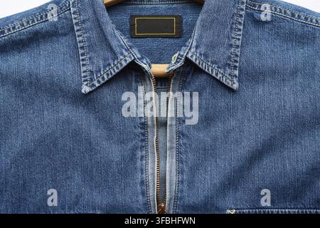 Denim mens shirt with metal front zipper, close up Stock Photo
