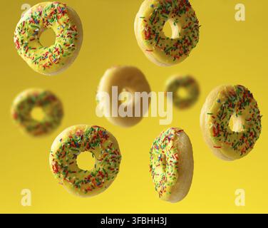 Round baked donuts sprinkled with multicolored sugar sprinkle levitate on a yellow background Stock Photo