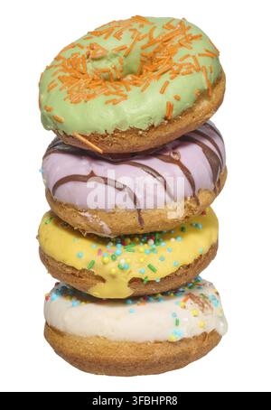 Stack of four colorful glazed donuts with assorted sprinkles and toppings, isolated background Stock Photo