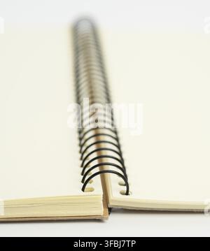 Open spiral notebook with blank white sheets, macro Stock Photo