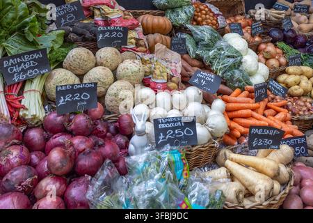 Fresh organic vegetables display at an outdoor street market. London, UK, 29 March 2024 Stock Photo