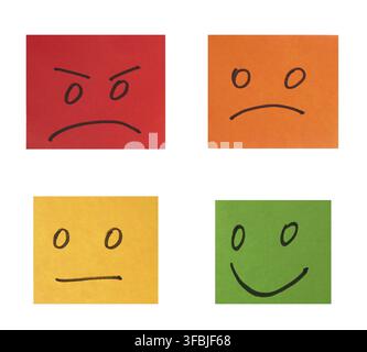 Multi-colored paper stickers with emotions on a white background, evaluation and rating Stock Photo
