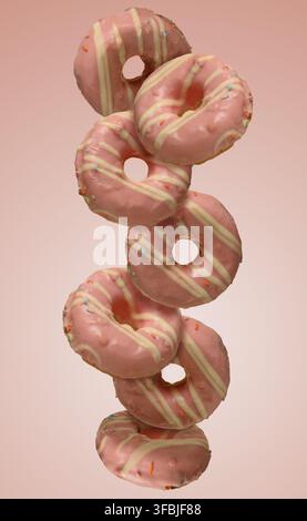 Donuts floating in the air and falling in a chaotic order, covered with pink icing with white stripes. Pink background Stock Photo