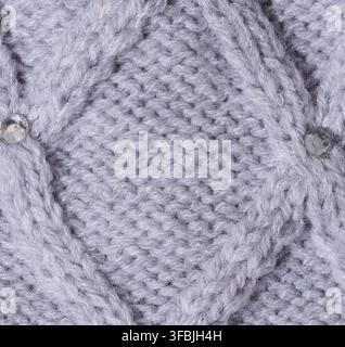 Texture of knitted gray fabric Stock Photo