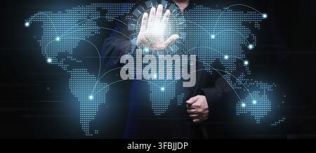A businessman establishes communication and exchange of information between the continents on a virtual holographic map of the world. Global network Stock Photo