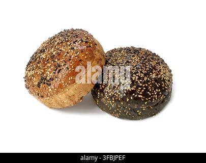 Two baked sesame seed buns isolated on white background, hamburger bread Stock Photo