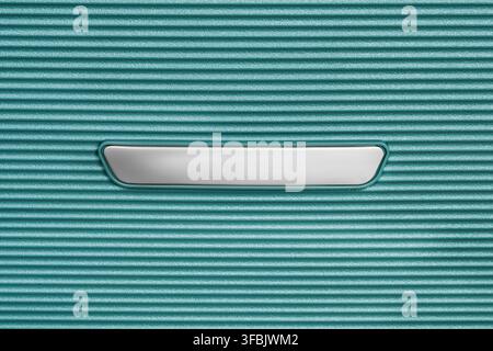 Blank metal nameplate on blue plastic ribbed background Stock Photo