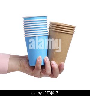 Hand hold brown paper cardboard cups on a isolated background. Eco-friendly tableware Stock Photo