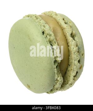 Green pistachio macaron on white isolated background, close up Stock Photo