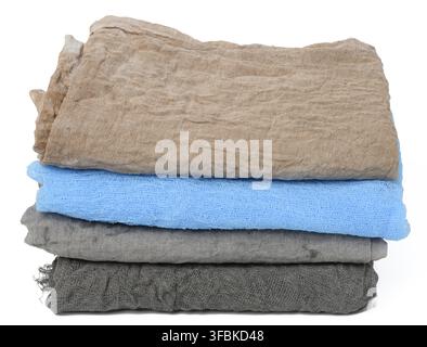 Folded black, blue, gray gauze kitchen napkin on white background, close up Stock Photo