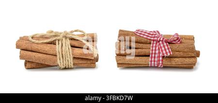 Dry cinnamon sticks tied with red ribbon, spice isolated on white background, set Stock Photo