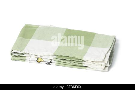 Folded green linen towel on white background, top view Stock Photo