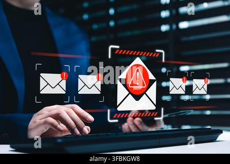 Phishing Email Warning Alert Concept. Person using detecting dangerous spam messages, representing cyber threat, e-mail security awareness, data prote Stock Photo