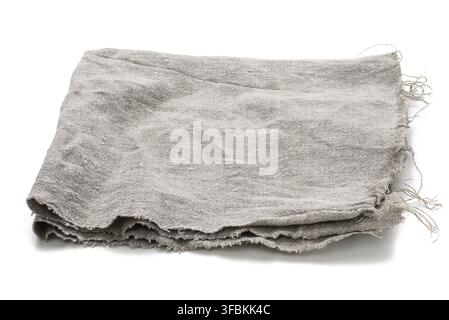 Folded gray linen tea towel on white background, close up Stock Photo