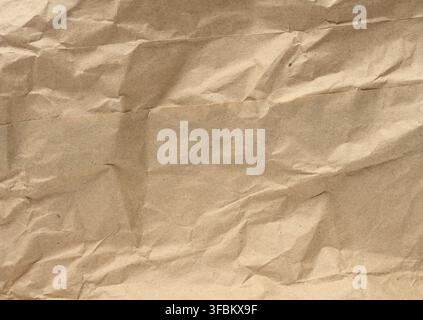 Texture of brown crumpled craft paper, full frame Stock Photo