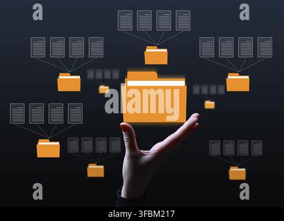 A female hand and virtual icons of folders and files, a concept of data organization and archiving, remote data management, paperless Stock Photo