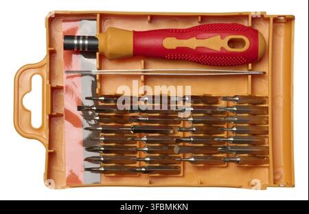 Plastic box with screwdriver and various bits for screws on isolated background Stock Photo
