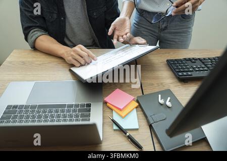 Collaborative work Software engineers website developer technologies or programmer working coding on startup ai application project on screen with par Stock Photo