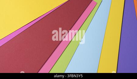 Abstract bright background from multicolored paper, backdrop for designer, copy space Stock Photo