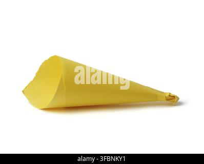 Cone-rolled cardboard sheet of paper isolated on white background, empty eco-bag for bulk products Stock Photo