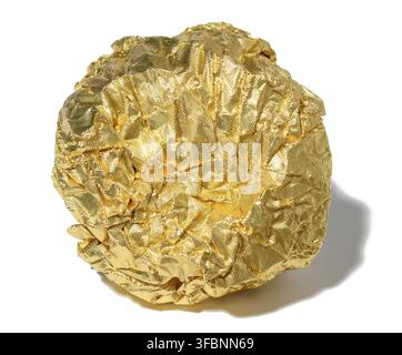 Crumpled piece of golden foil with shadow on a white isolated background, close up Stock Photo