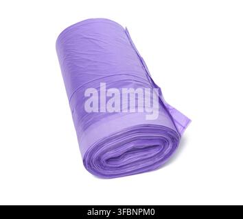 Skein of purple plastic trash bags with strings isolated on white background, close up Stock Photo