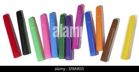 Stack of multicolored felt-tip pens isolated on white background, top view Stock Photo