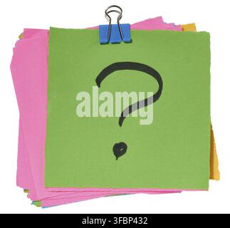 Stack of multicolored sticky notes with a black question mark drawn on the top green sticky note, secured with a blue paper clip. Isolated background Stock Photo