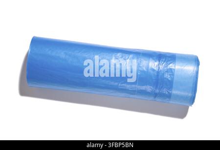 Blue plastic trash bags with strings on white background, top view Stock Photo