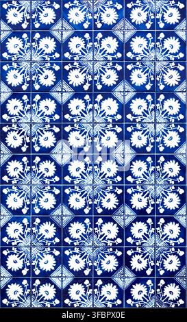 Traditional blue and white azulejo tiles. Vintage ceramic floral and geometric background. Church of Santa Marinha in Cortegaca. High quality photo Stock Photo