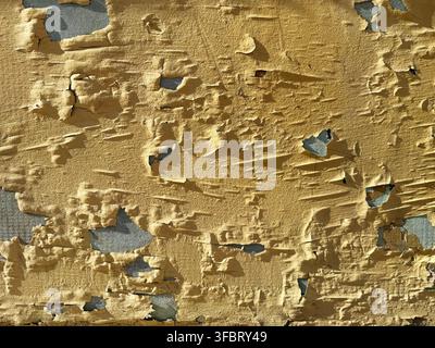 Old concrete house wall with peeling paint Stock Photo