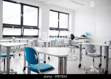 Empty modern classroom ready for start of new school year. Stock Photo