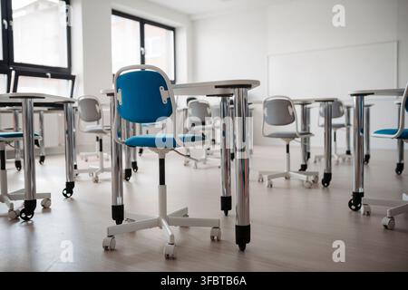 Empty modern classroom ready for start of new school year. Stock Photo
