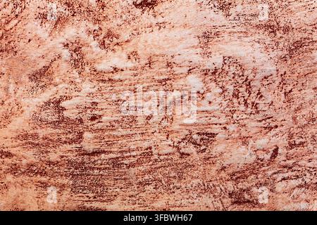 Weathered red painted plaster wall texture Stock Photo