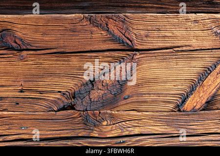 Weathered wood plank texture with knot and cracks Stock Photo