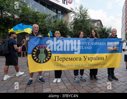 Glasgow Scotland, UK. 24th Aug, 2026. Ukrainians gathered with flags and banners in St Enochs Square for Ukrainian Independence Day, commemorating the 1991 declaration of independence from the Soviet Union. Credit: Richard Gass/Alamy Live News Stock Photo