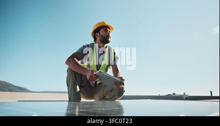 Thinking, man and solar panel technician with tablet, research and inspection for fault detection. Space, outdoor or ideas with digital for pv grid Stock Photo