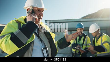 Construction, review or supervisor outdoor with phone call, site brief or progress track in chat. Contact, lead or mature engineer with tech Stock Photo