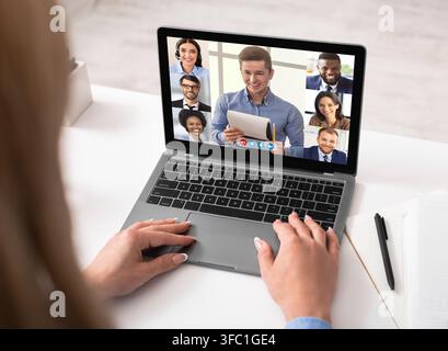 Business Woman Using Laptop Having Video Call Meeting In Office Stock Photo