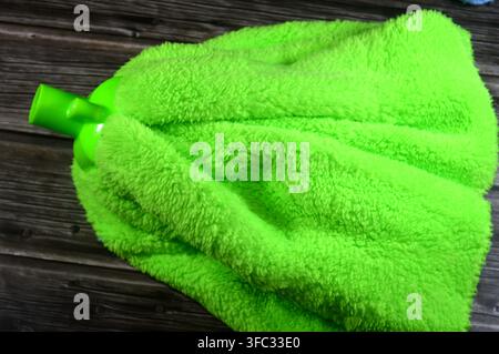 microfiber towel mop, super absorbent for superior spill and dirt pick-up, providing a thorough cleaning on all floor surfaces including hardwood, til Stock Photo