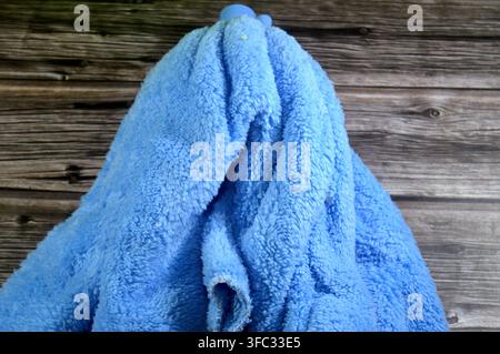 microfiber towel mop, super absorbent for superior spill and dirt pick-up, providing a thorough cleaning on all floor surfaces including hardwood, til Stock Photo