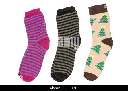 Set of different woolen socks on a white background. Three pairs of socks. Stock Photo