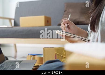 Organization of shipping details in a notice book Stock Photo