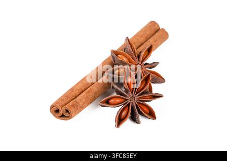 Dried Cinnamon Sticks and Star Anise Pods Isolated on White Background Stock Photo